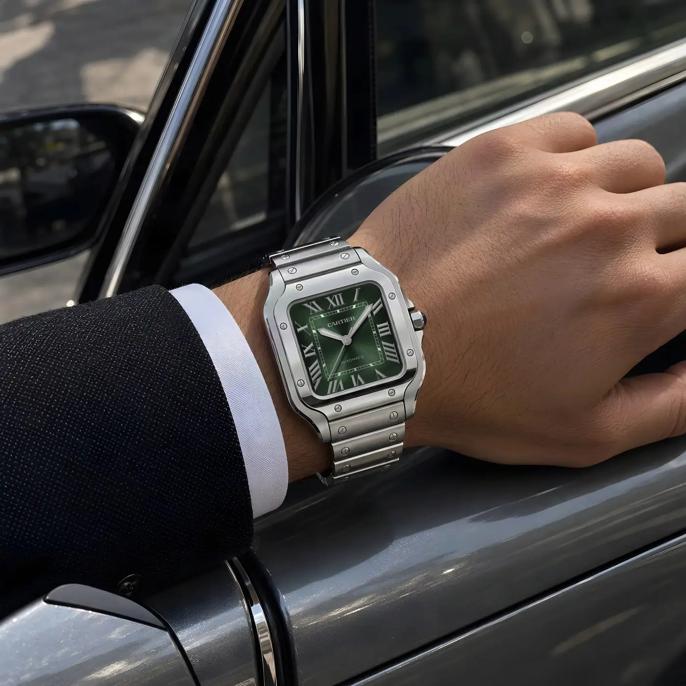 Cartier Santos with a green dial on a wrist