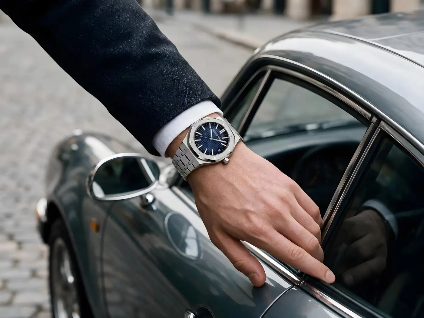 Audemars Piguet Royal Oak with a blue dial on a wrist